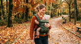 Babywearing Autunnale: Perché Fasce e Marsupi sono il Must-Have di Stagione